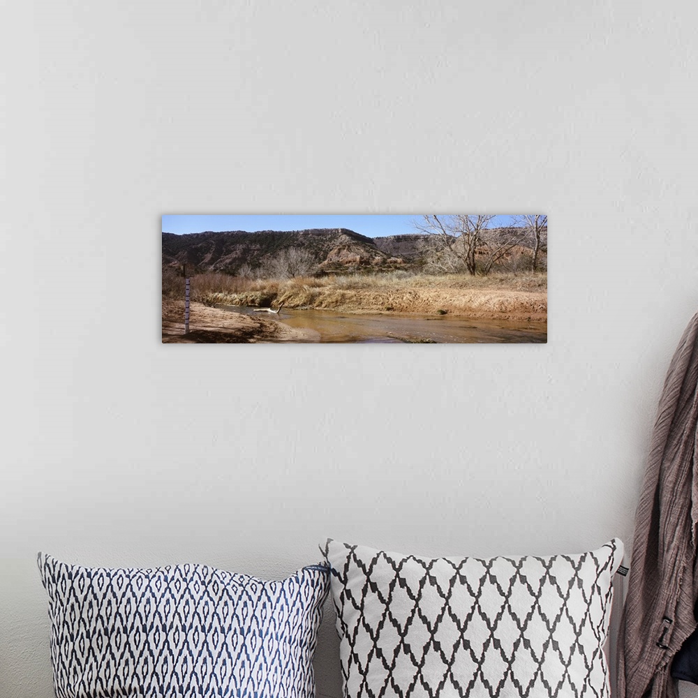A bohemian room featuring River passing through a landscape, Palo Duro Canyon State Park, Texas