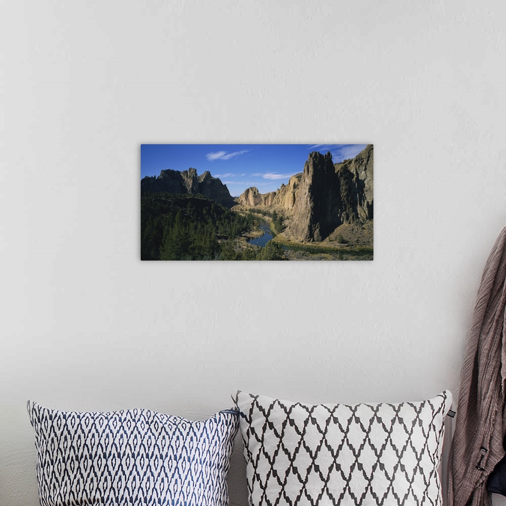 A bohemian room featuring River passing through a rocky landscape, Ochoco River, Smith Rocks State Park, Oregon