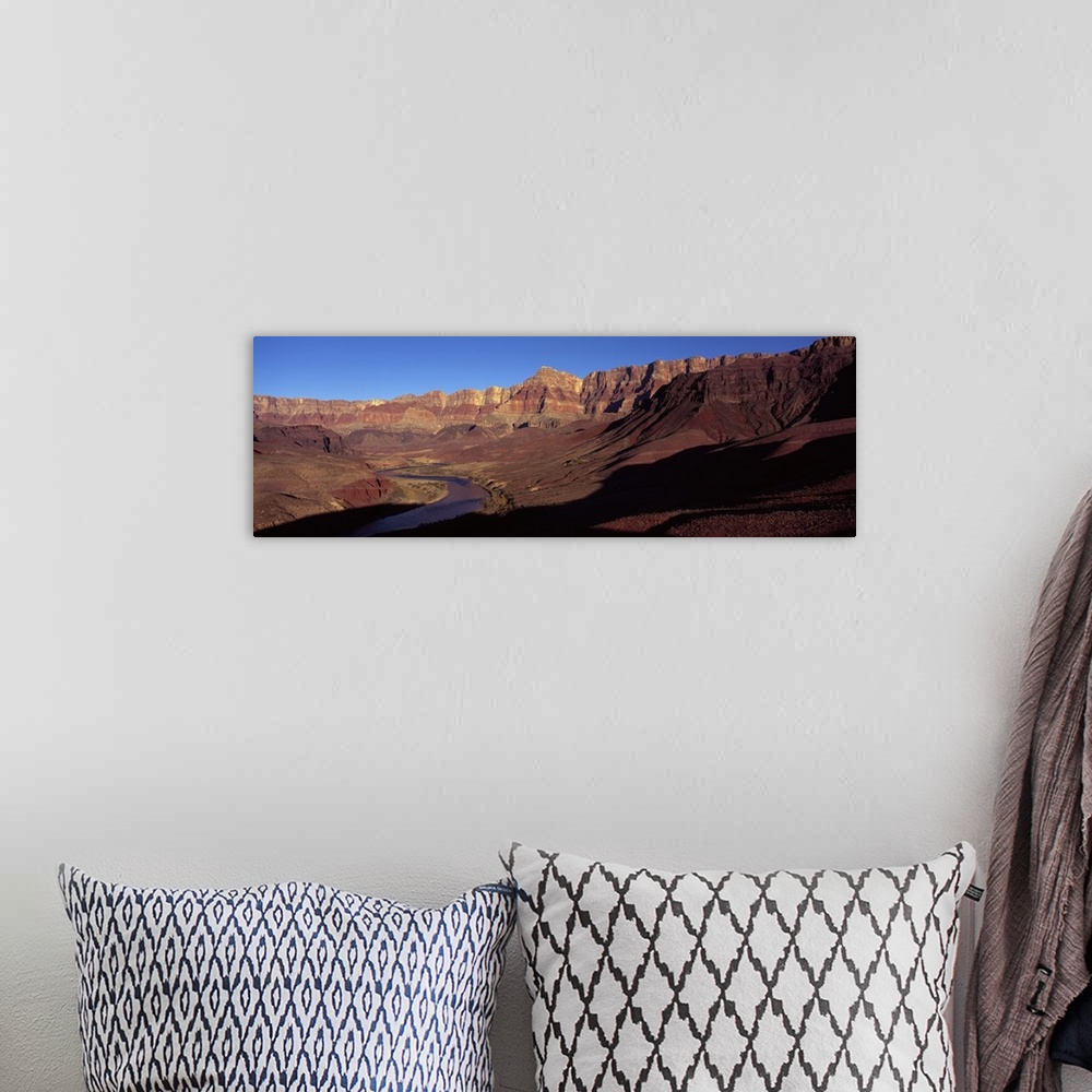 A bohemian room featuring River passing through rocks, Grand Canyon, Colorado River, Cococino County, Arizona