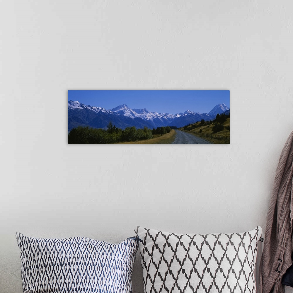 A bohemian room featuring Road running through a landscape, Mt Cook, Southern Alps, New Zealand