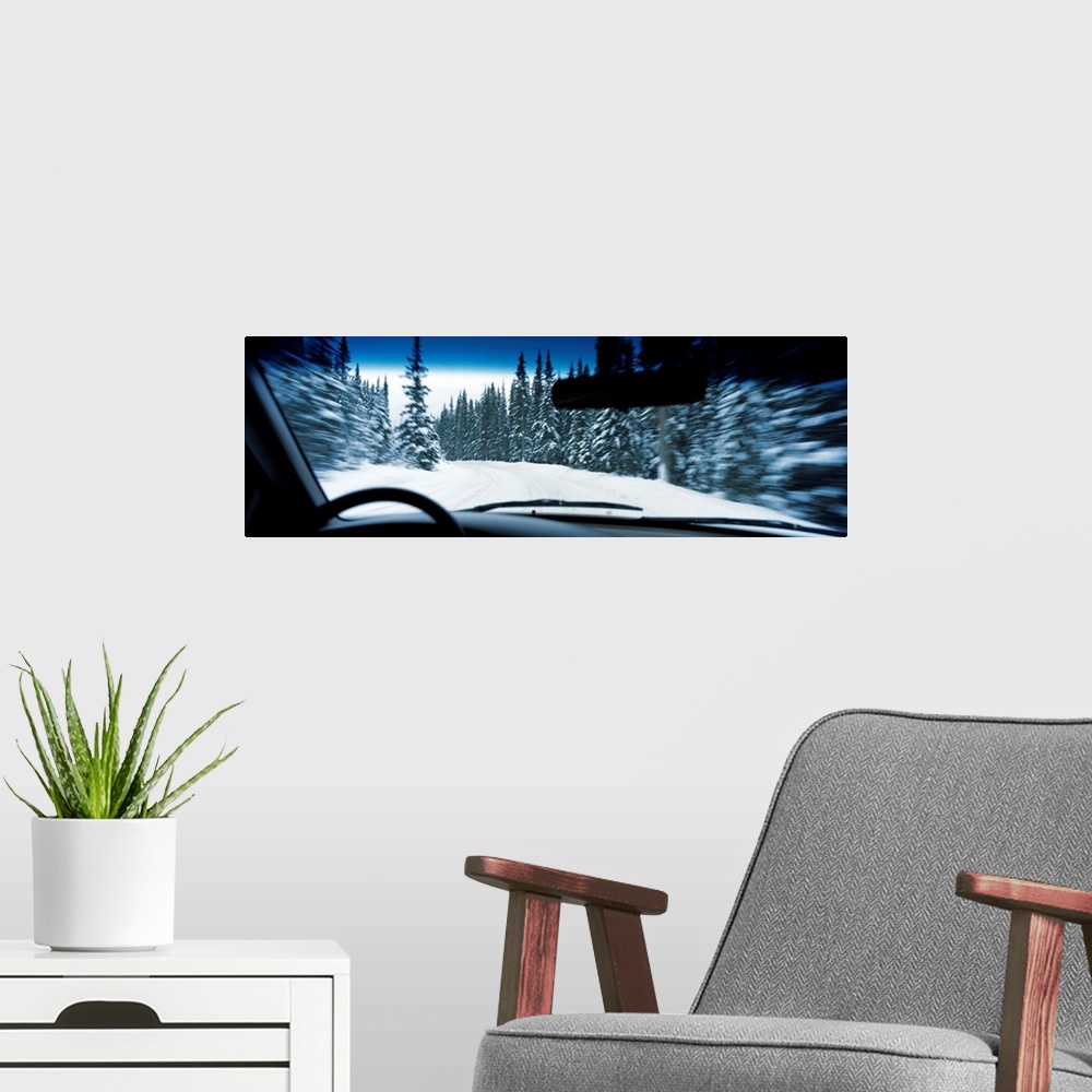 A modern room featuring Road viewed from a car, Spray Lakes Road, Kananaskis Country, Alberta, Canada
