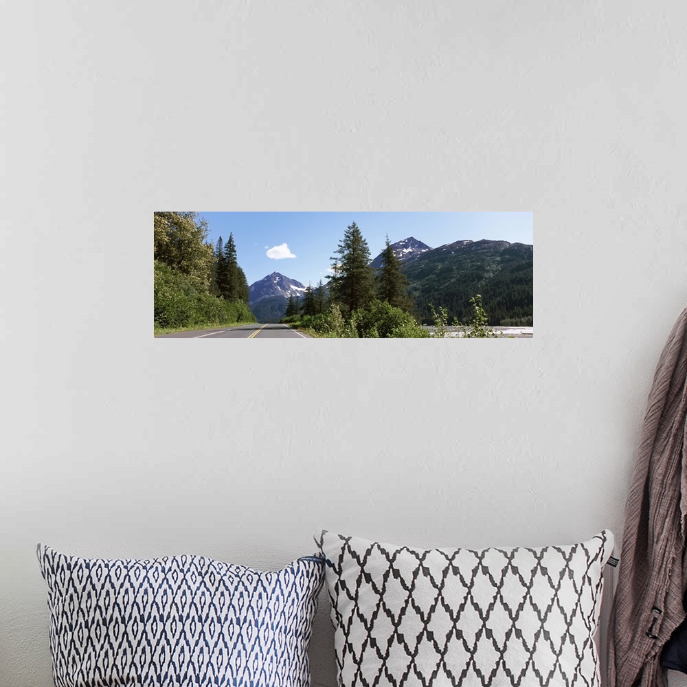 A bohemian room featuring Road with a mountain in the background, Exit Glacier Road, Seward, Kenai Peninsula Borough, Alask...