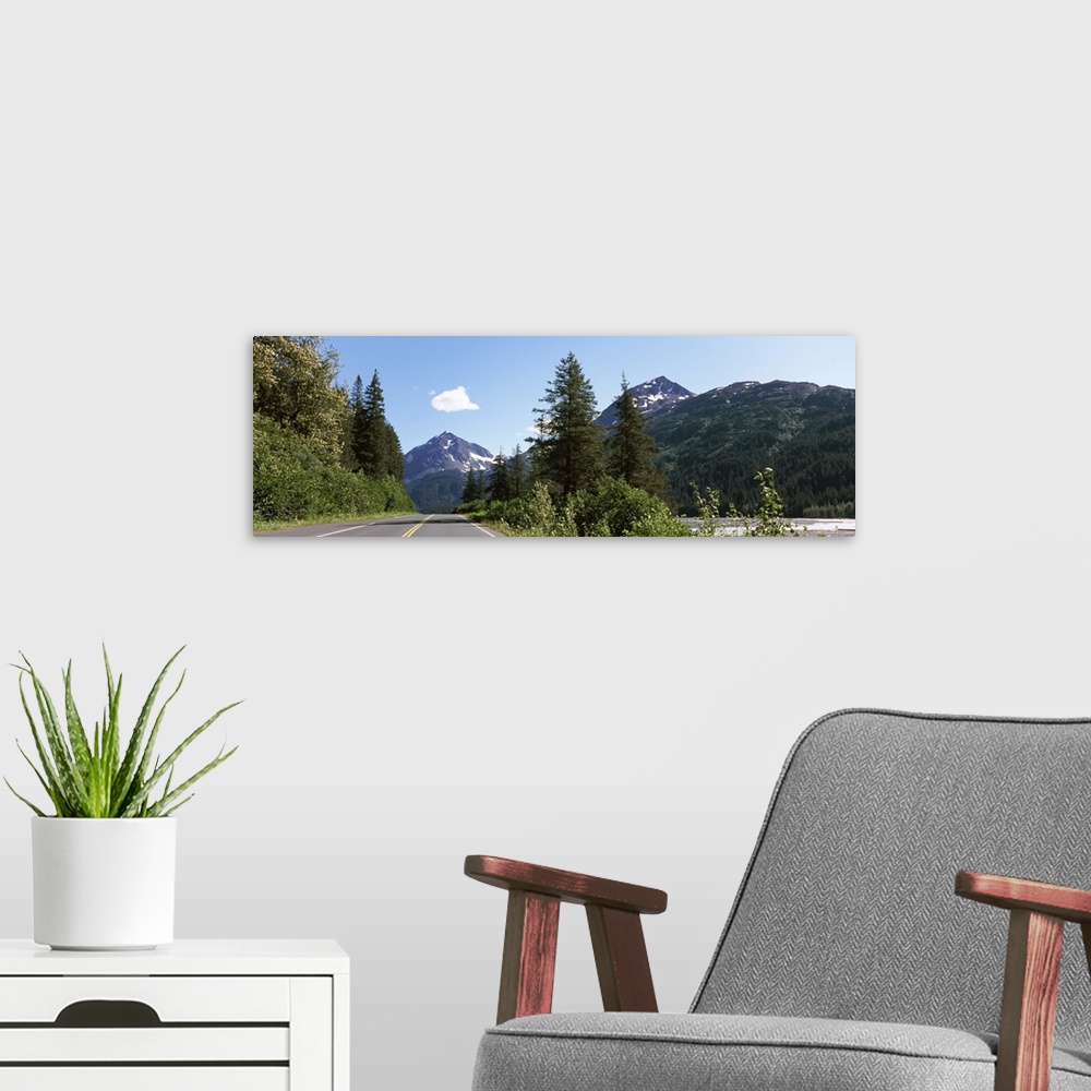 A modern room featuring Road with a mountain in the background, Exit Glacier Road, Seward, Kenai Peninsula Borough, Alask...