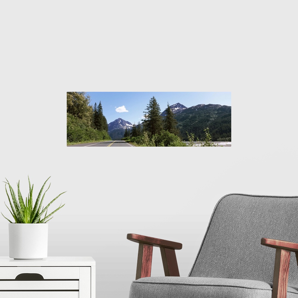 A modern room featuring Road with a mountain in the background, Exit Glacier Road, Seward, Kenai Peninsula Borough, Alask...