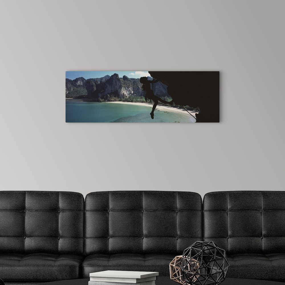 A modern room featuring Rock Climber atKrabi, southern Thailand, with Railay beach in background