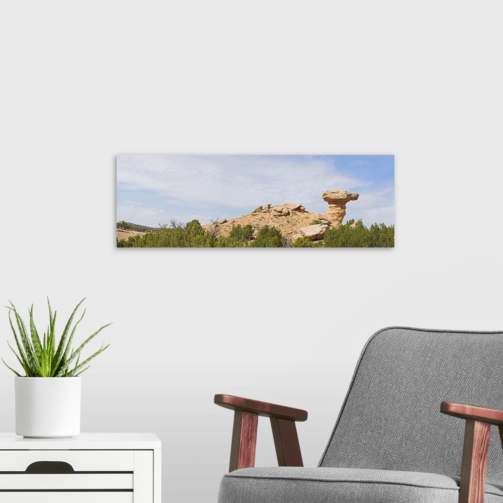 A modern room featuring Rock formation on a landscape, Camel Rock, Espanola, Santa Fe, New Mexico