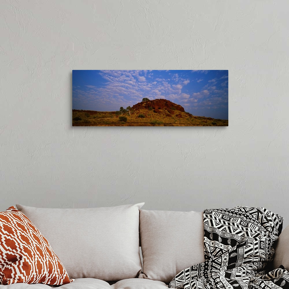 A bohemian room featuring Rock formation on a landscape, The Pilbara, Western Australia, Australia