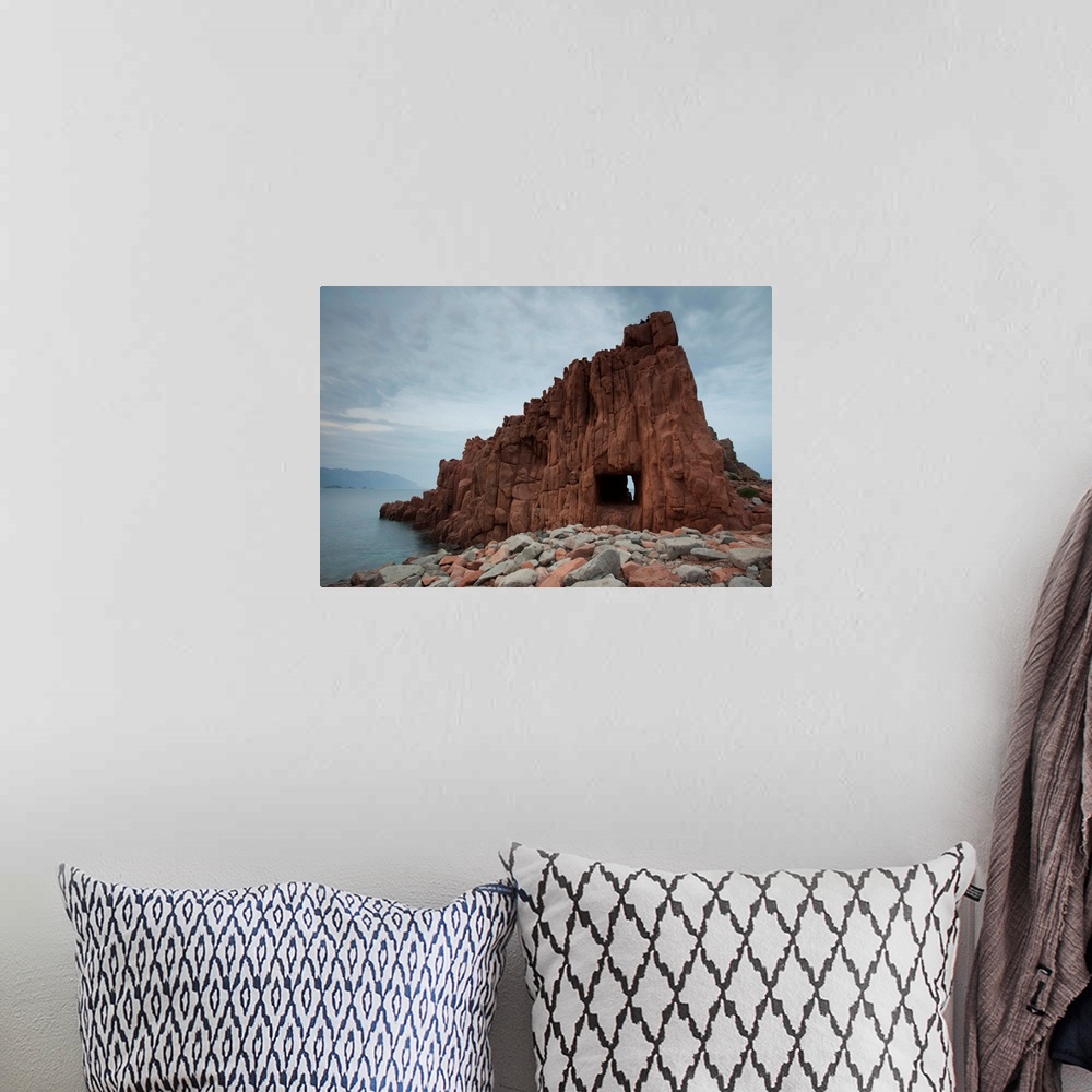 A bohemian room featuring Rock formation on the coast, Rocce Rosse, Arbatax, Ogliastra, Sardinia, Italy