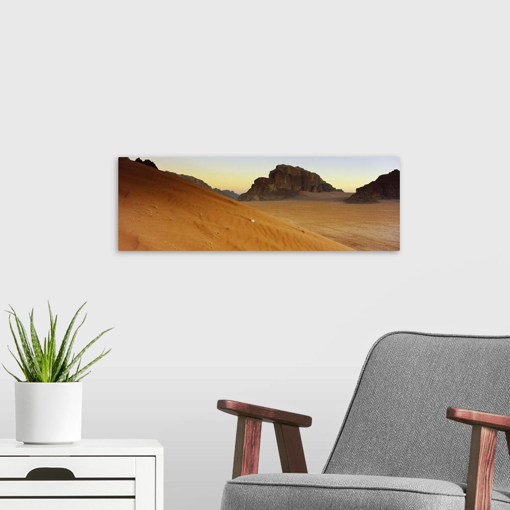 A modern room featuring Rock formations in a desert, Jebel Qatar, Wadi Rum, Jordan