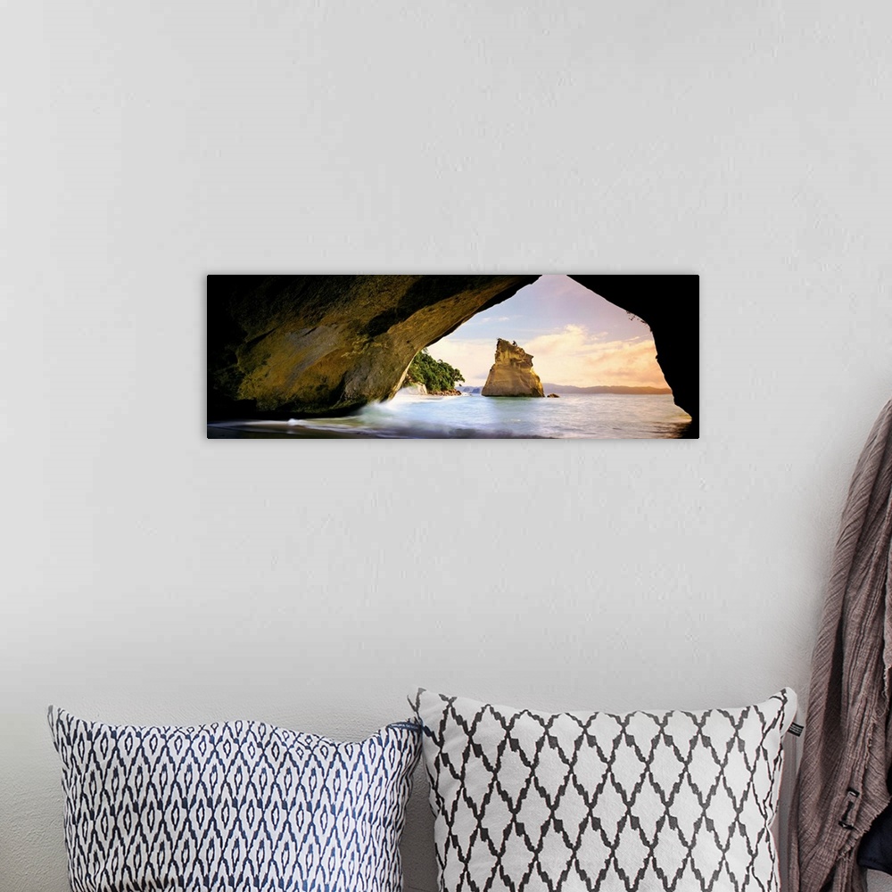 A bohemian room featuring Rock formations in the Pacific Ocean, Cathedral Cove, New Zealand