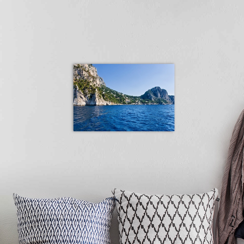 A bohemian room featuring Rock formations in the sea Capri Naples Campania Italy