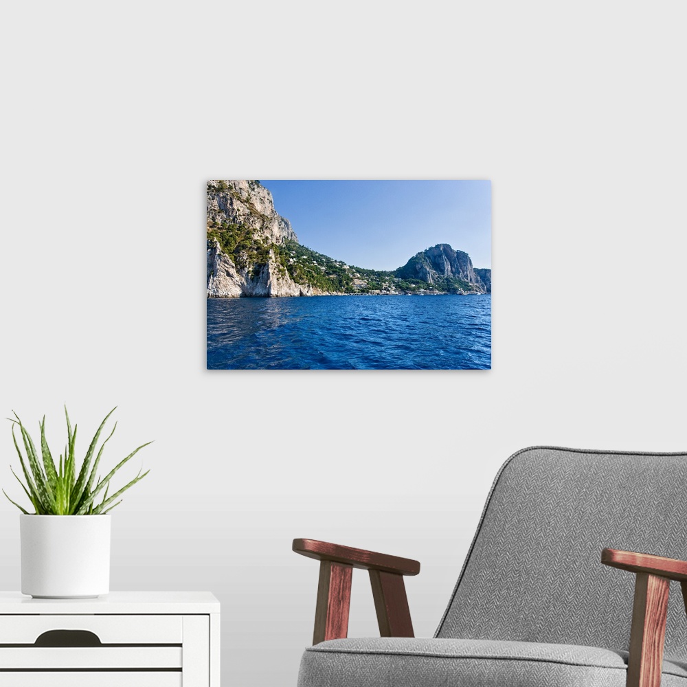 A modern room featuring Rock formations in the sea Capri Naples Campania Italy