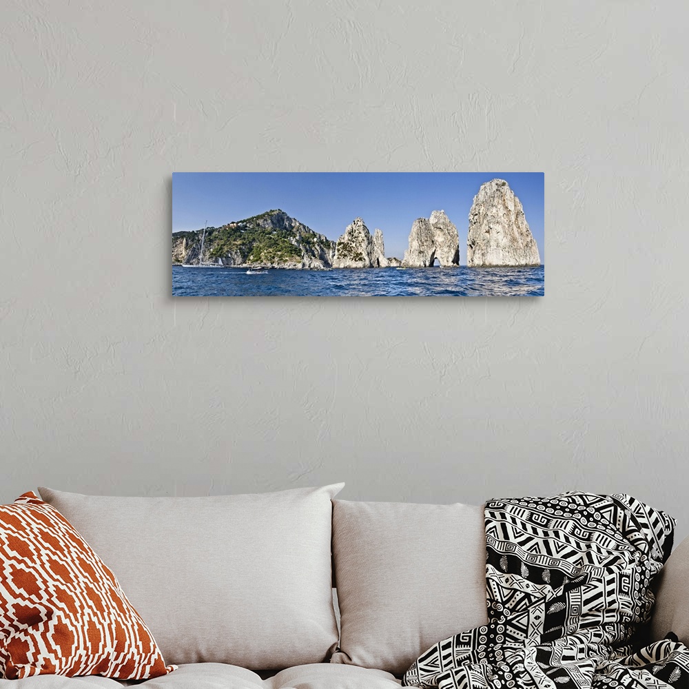 A bohemian room featuring Rock formations in the sea Faraglioni Capri Naples Campania Italy