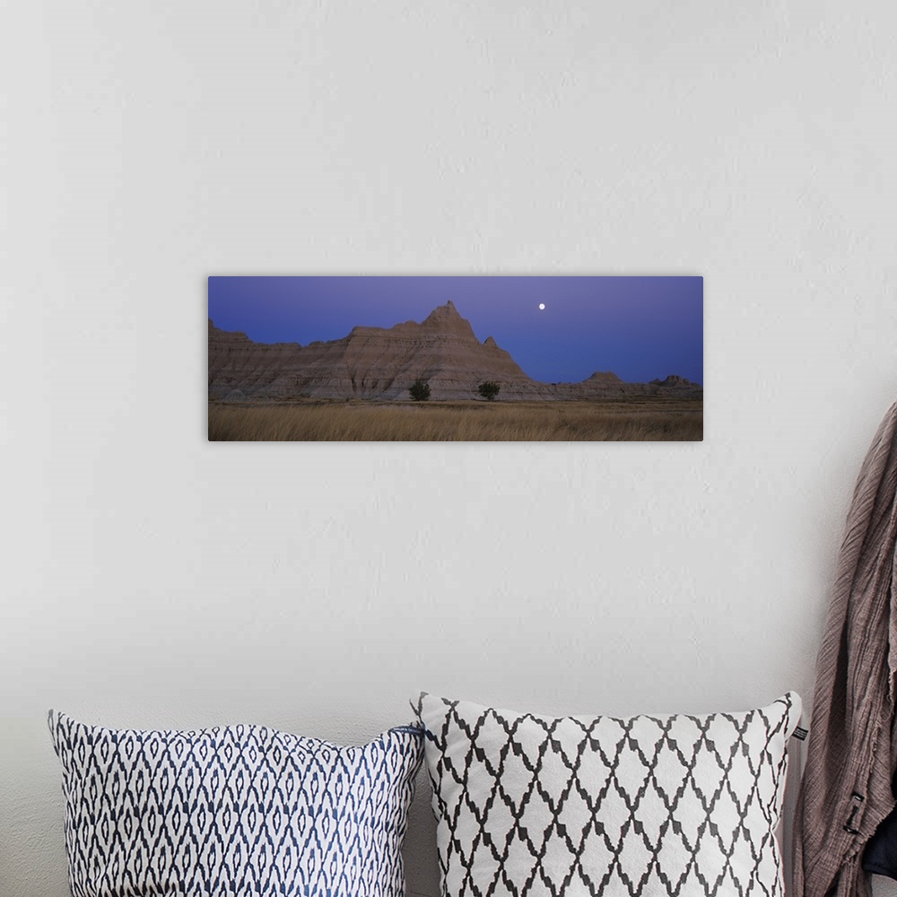 A bohemian room featuring Rock formations on a landscape, Badlands National Park, South Dakota