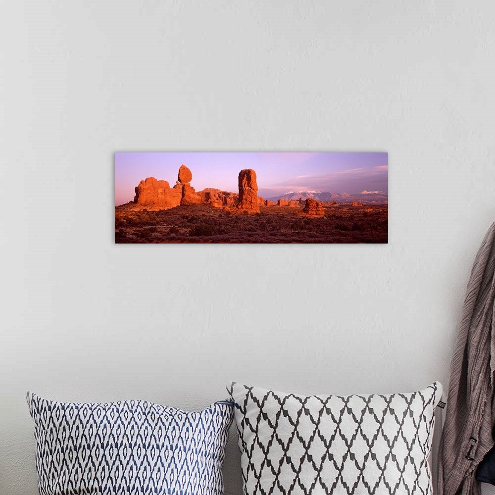 A bohemian room featuring Rock formations on a landscape, Balanced Rock, Arches National Park, Utah