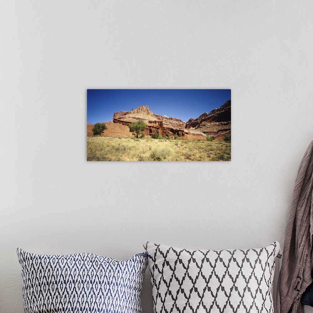 A bohemian room featuring Rock formations on a landscape, Canyon De Chelly, Arizona