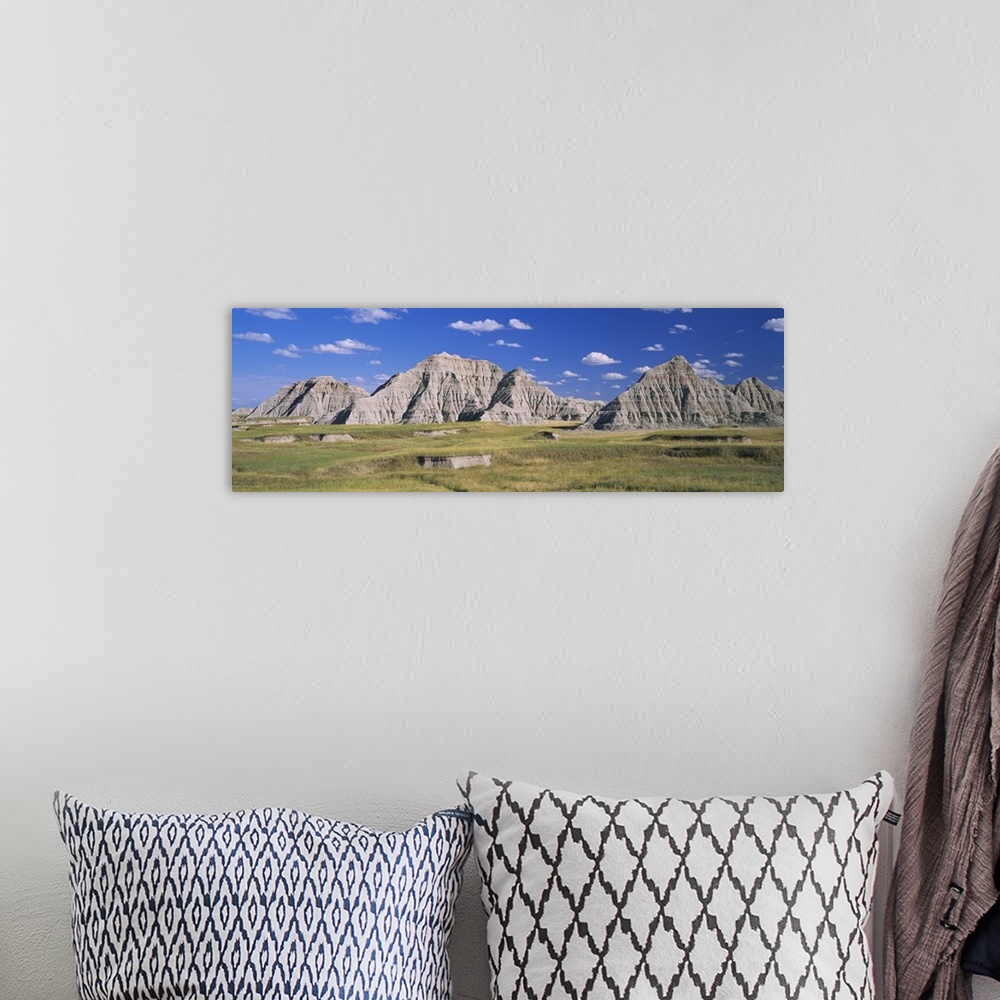 A bohemian room featuring Rock formations on a landscape, Cedar Pass, Badlands National Park, South Dakota