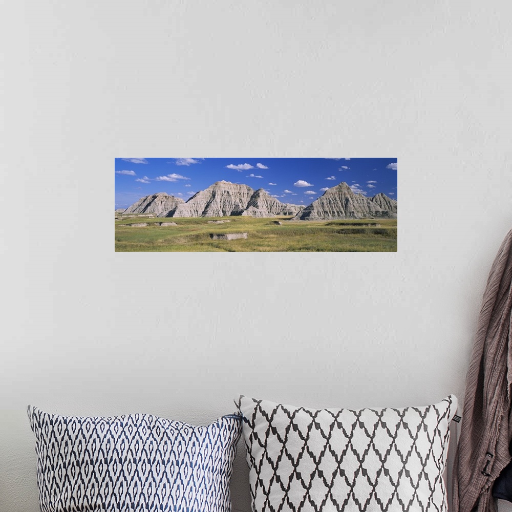 A bohemian room featuring Rock formations on a landscape, Cedar Pass, Badlands National Park, South Dakota