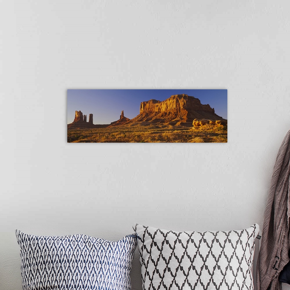A bohemian room featuring Rock formations on a landscape, Monument Valley, Monument Valley Tribal Park, Utah