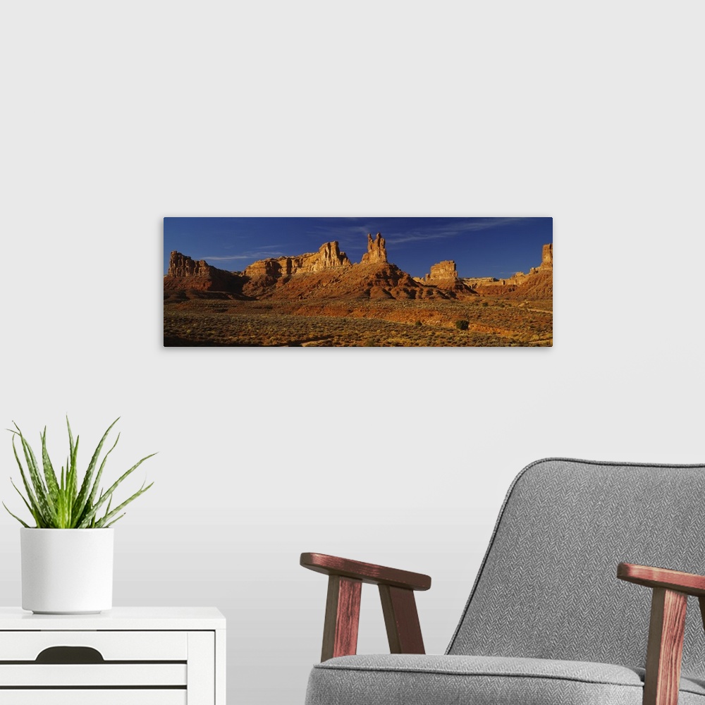 A modern room featuring Rock formations on a landscape, Monument Valley Tribal Park, Monument Valley, Arizona