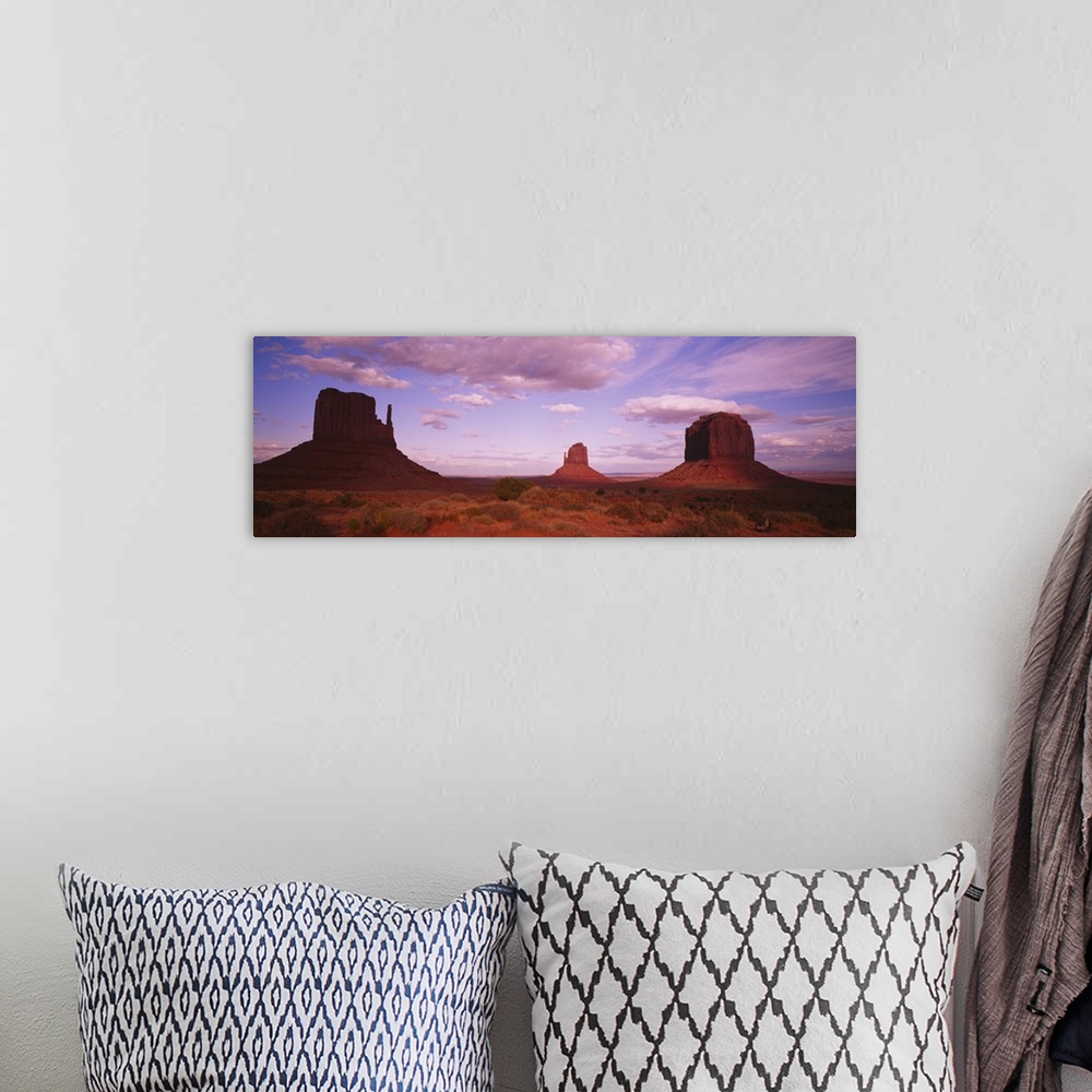 A bohemian room featuring Rock formations on a landscape, Monument Valley Tribal Park, Utah, Arizona