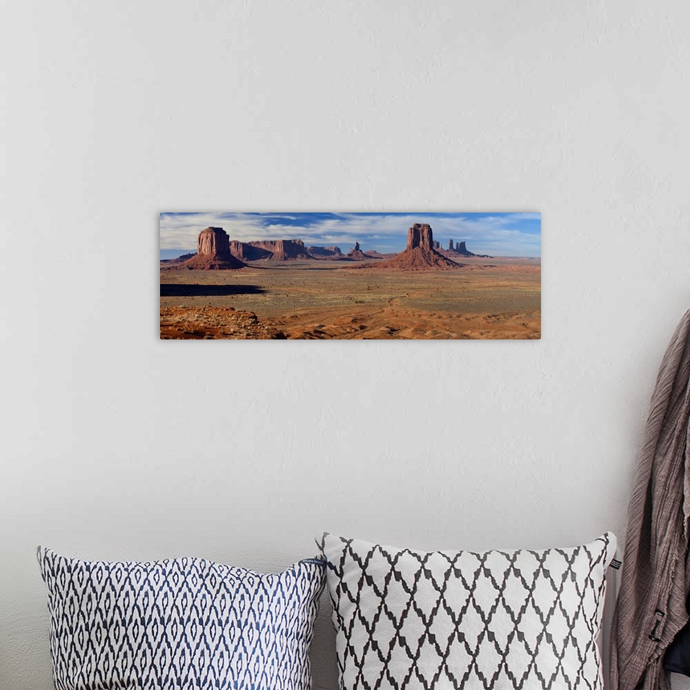 A bohemian room featuring Rock formations on a landscape, Monument Valley, Utah and Arizona,