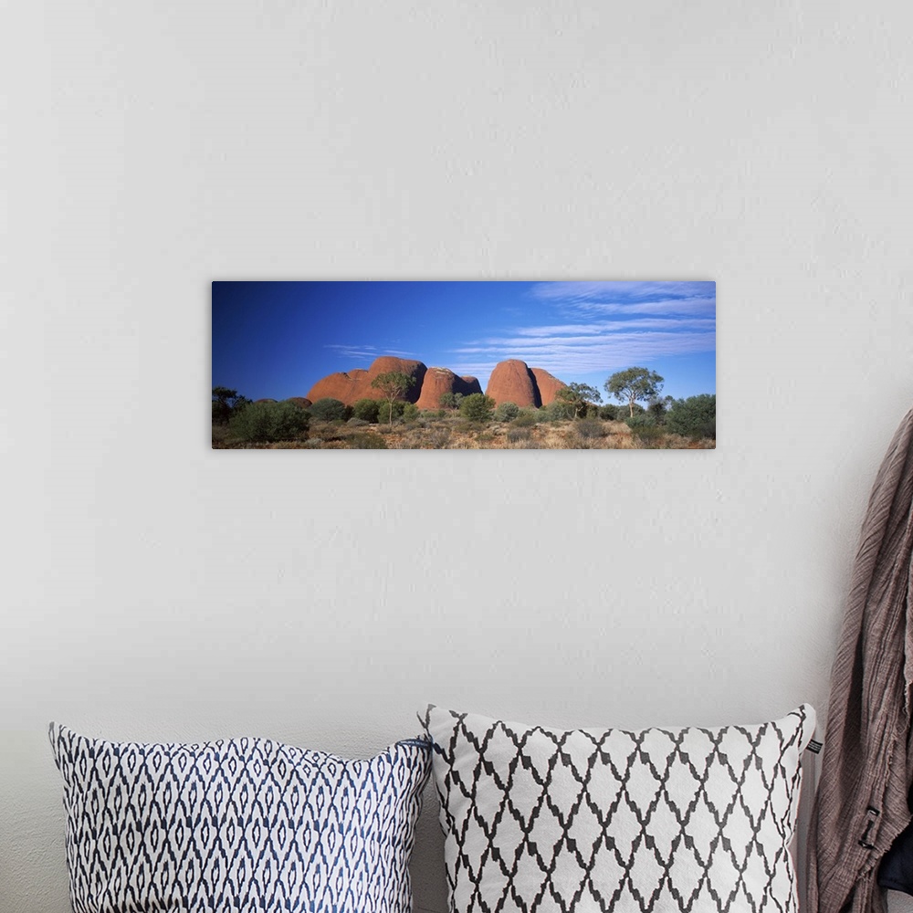 A bohemian room featuring Rock formations on a landscape, Olgas, Northern Territory, Australia
