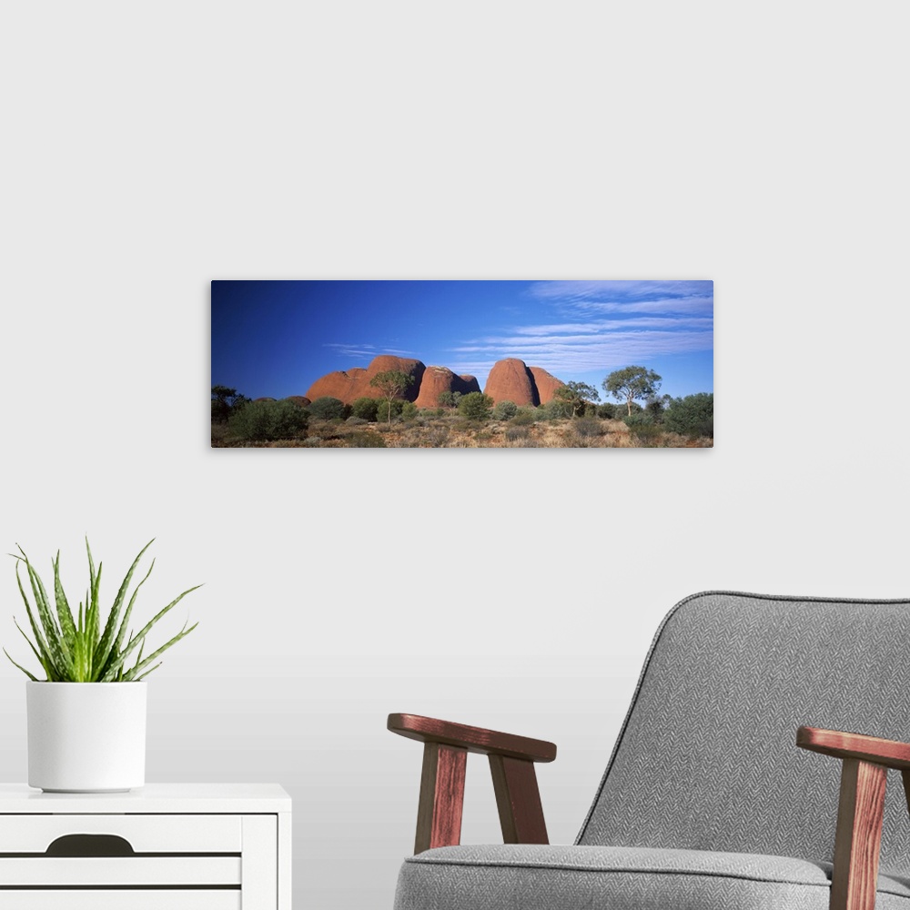 A modern room featuring Rock formations on a landscape, Olgas, Northern Territory, Australia