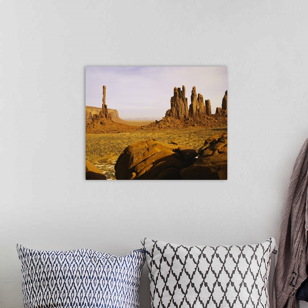 A bohemian room featuring Rock formations on a landscape, Totem Pole Rock, Yei Bi Chei, Monument Valley Tribal Park, Arizona