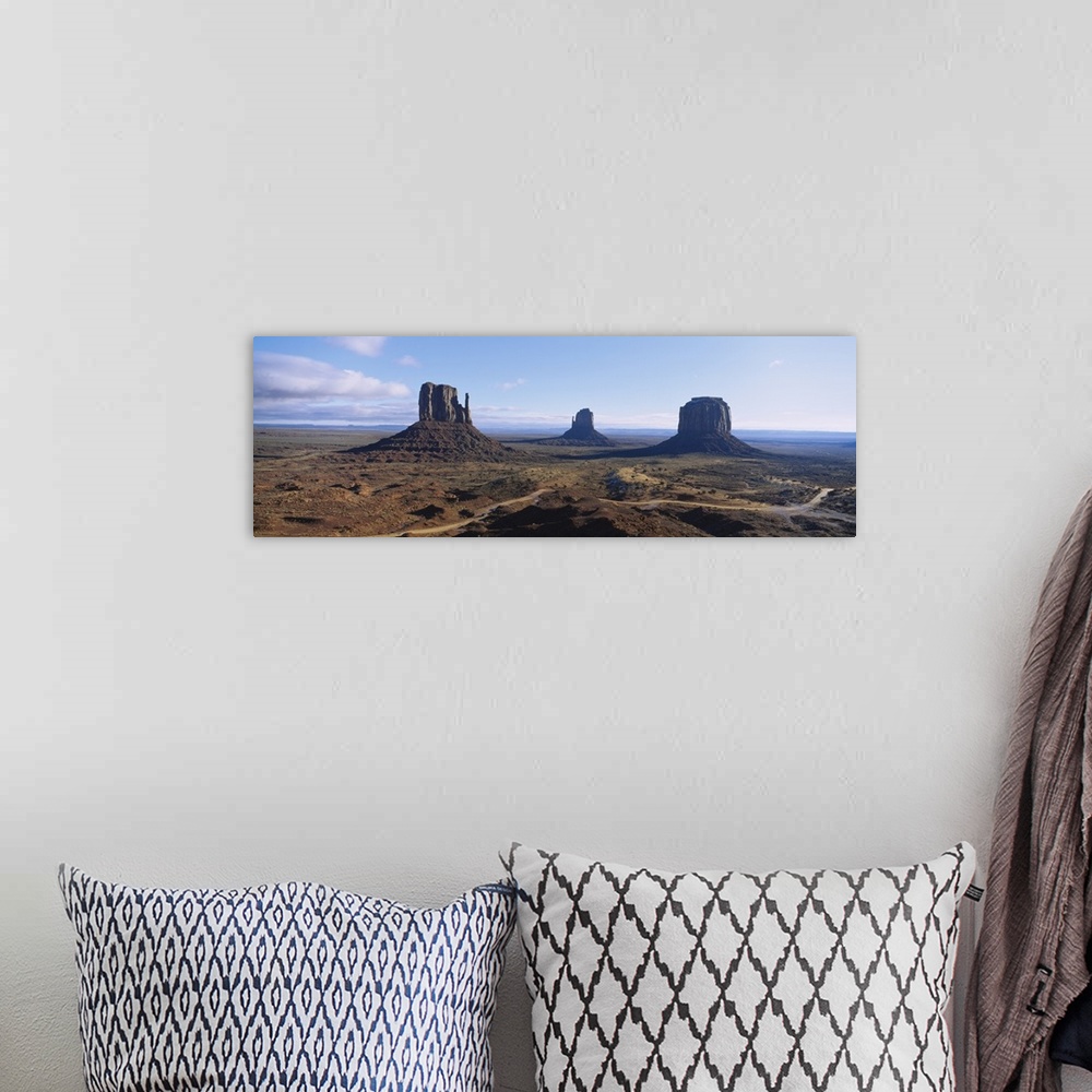 A bohemian room featuring Rock formations on an arid landscape, Monument Valley Tribal Park, Arizona