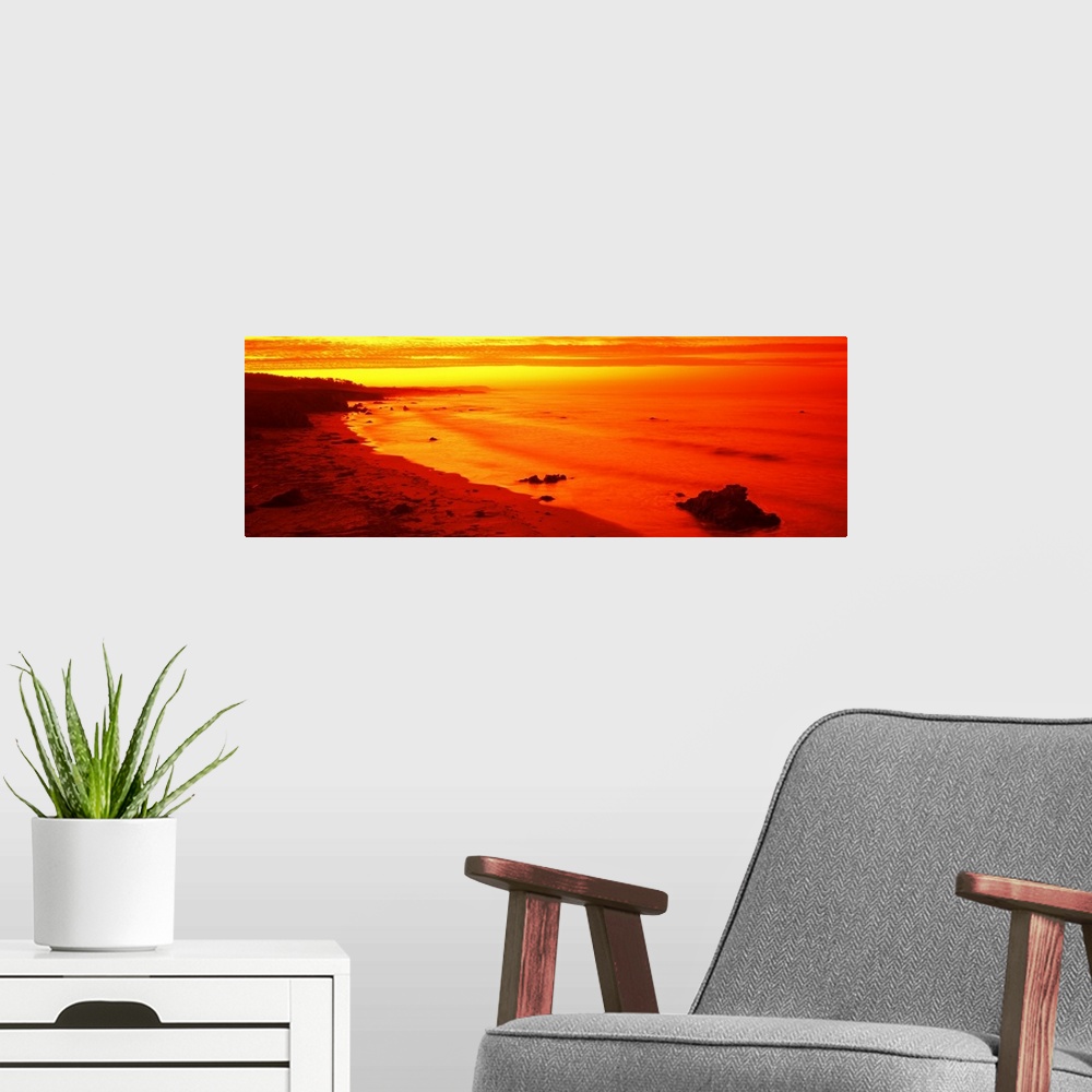 A modern room featuring Sunrise, California Coast