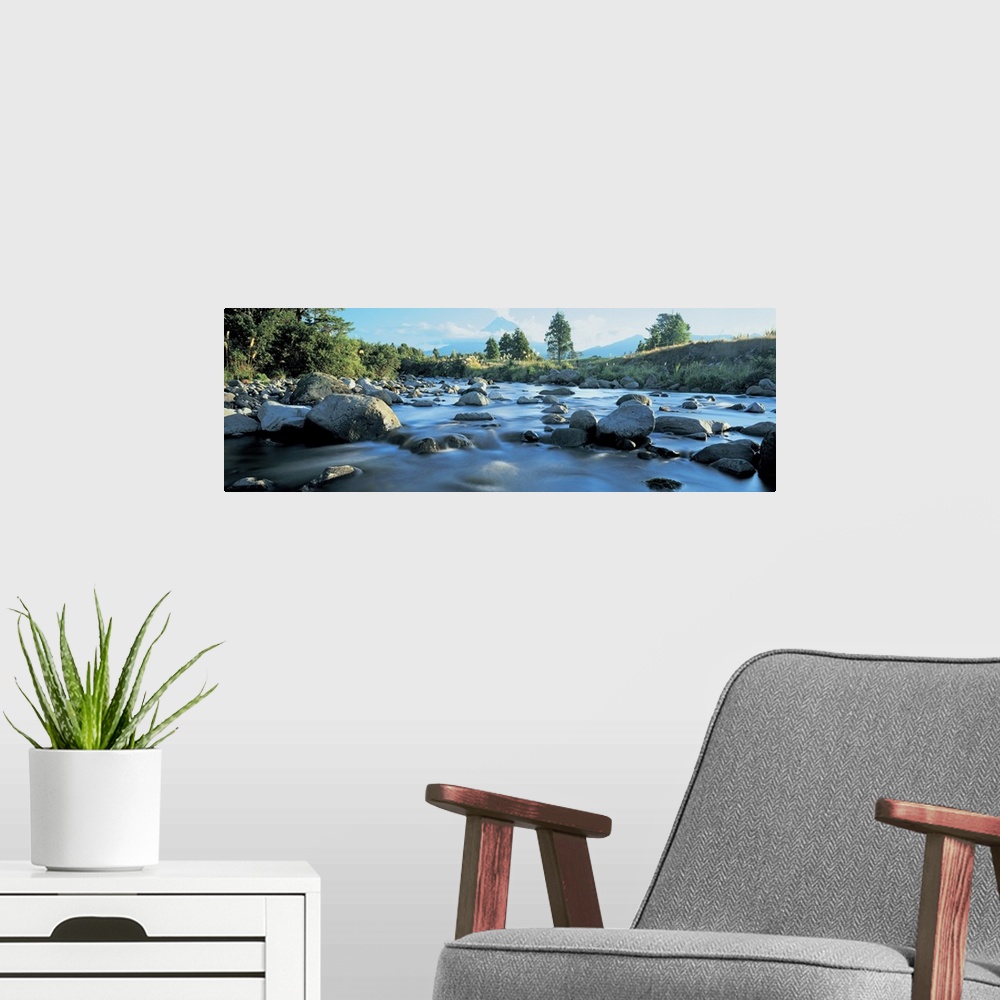A modern room featuring Rocks in the river, Mount Taranaki, Taranaki, North Island, New Zealand