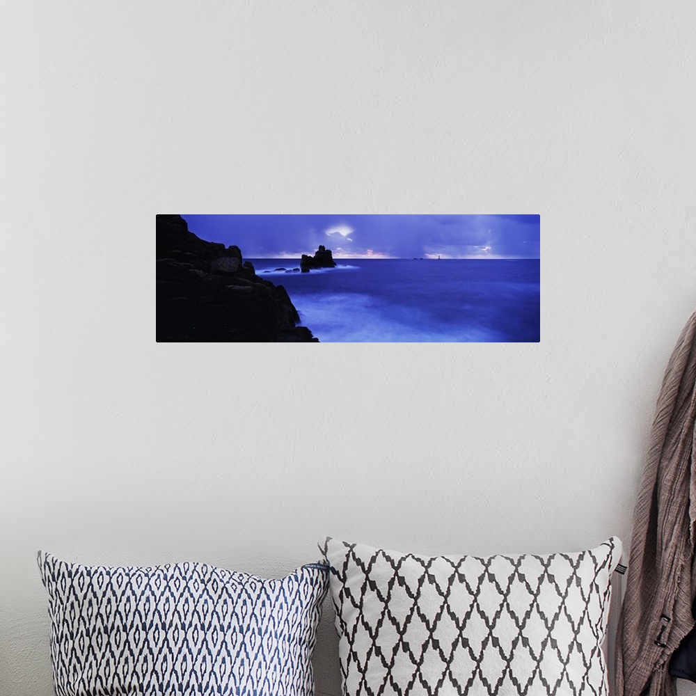 A bohemian room featuring Rocks in the sea, Armed Knight, Land's End, Cornwall, England