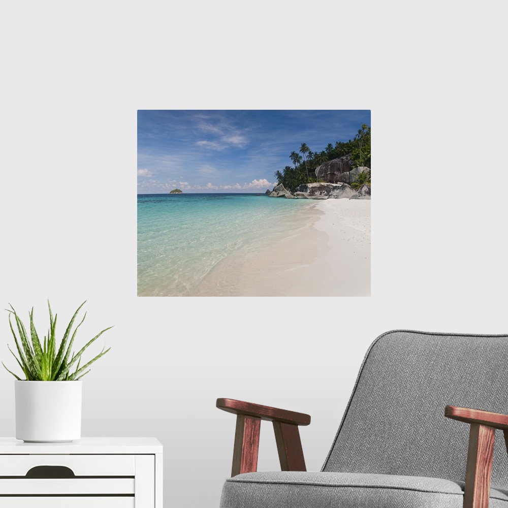 A modern room featuring Square photograph on a big canvas looking down the shoreline of clear blue water and white sands ...