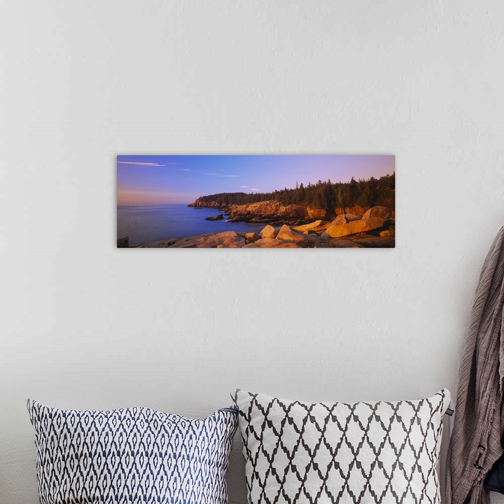 A bohemian room featuring Wide angle photograph of the rocky shoreline, surrounded by trees at sunset, in Acadia National P...