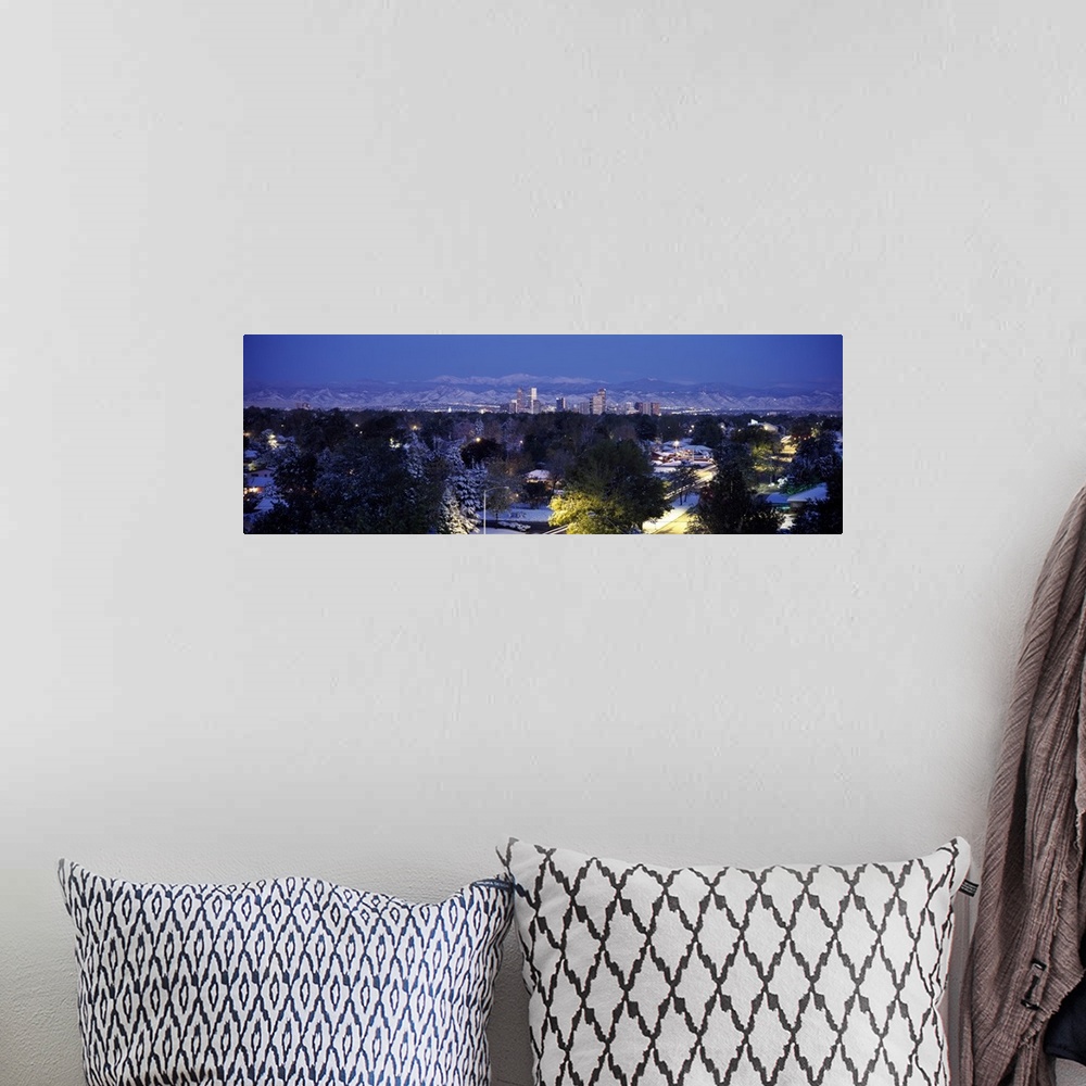 A bohemian room featuring Panoramic photo on canvas of the cityscape of Denver with snowy mountains in the distance.