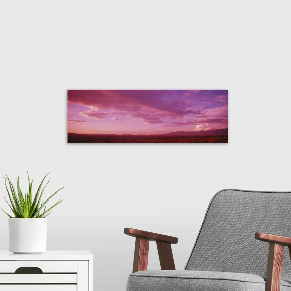 A modern room featuring Romantic sky at sunset, Taos Plateau, Taos, New Mexico