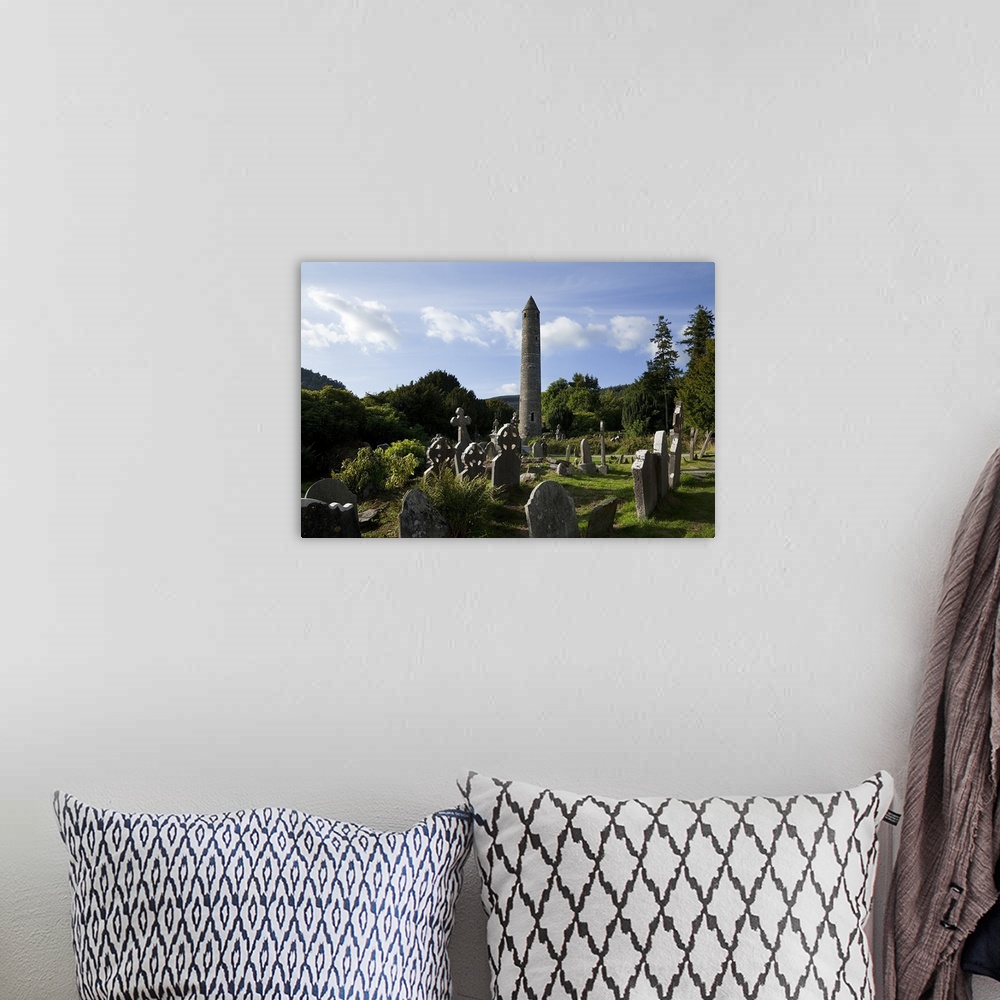 A bohemian room featuring Round Tower and Graveyard in Glendalough Early Monastic Site, County Wicklow, Ireland