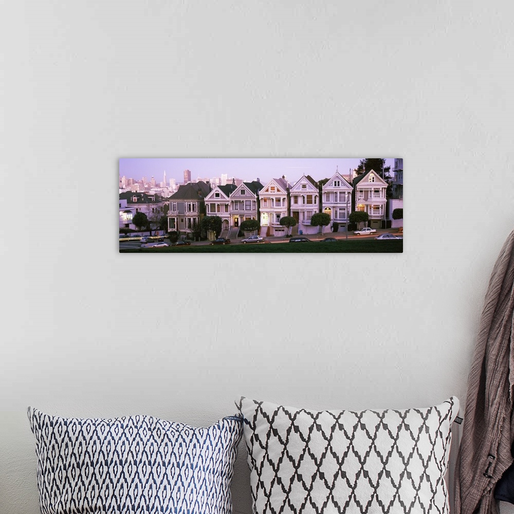 A bohemian room featuring Row houses in a city, Postcard Row, The Seven Sisters, Painted Ladies, Alamo Square, San Francisc...