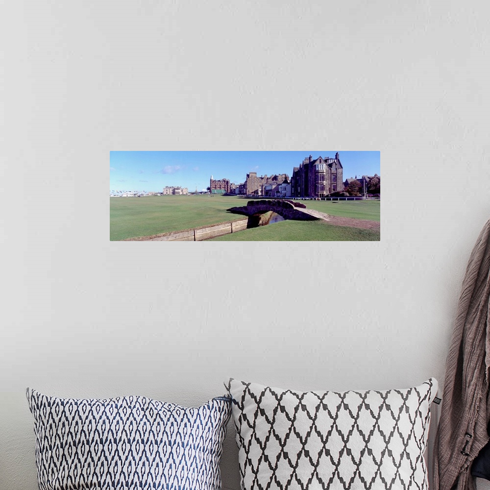 A bohemian room featuring Panoramic photograph shows Swilcan Bridge connecting two fairways in The Royal and Ancient Golf C...