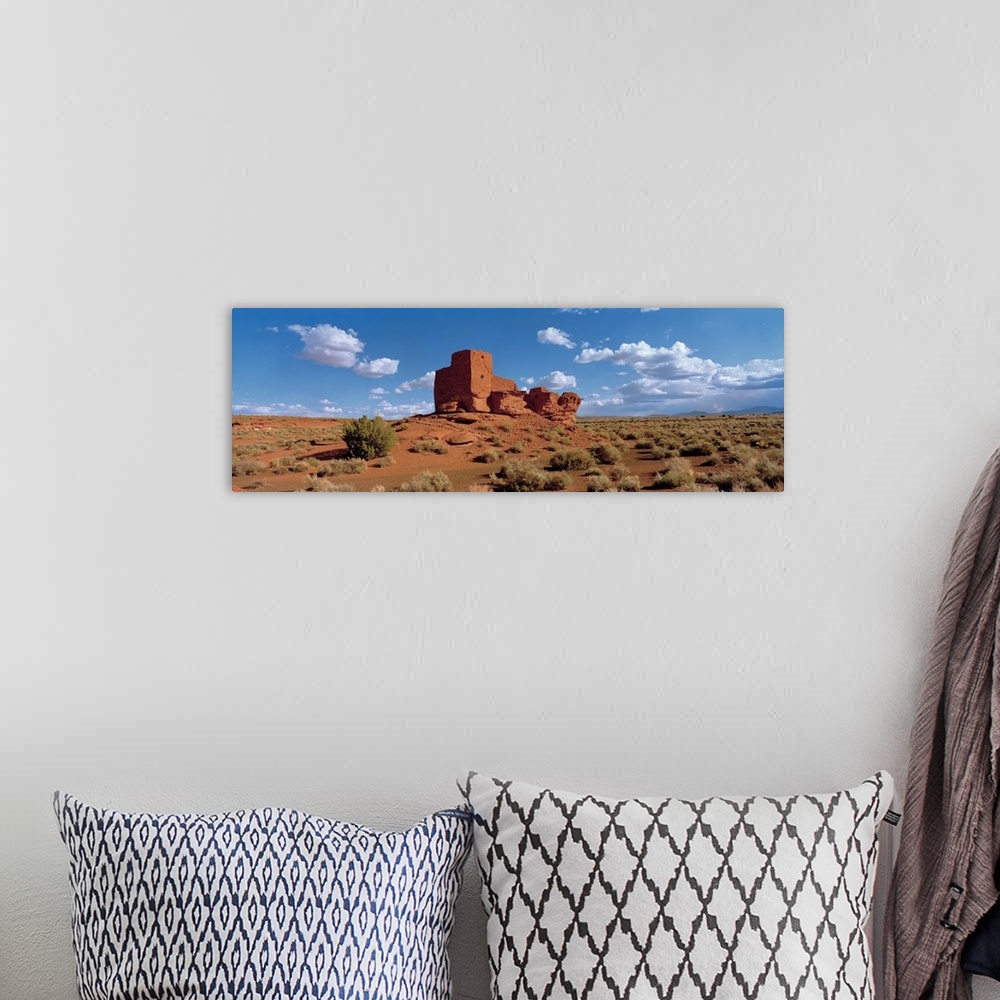 A bohemian room featuring Ruins of a building in a desert, Wukoki Ruins, Wupatki National Monument, Arizona