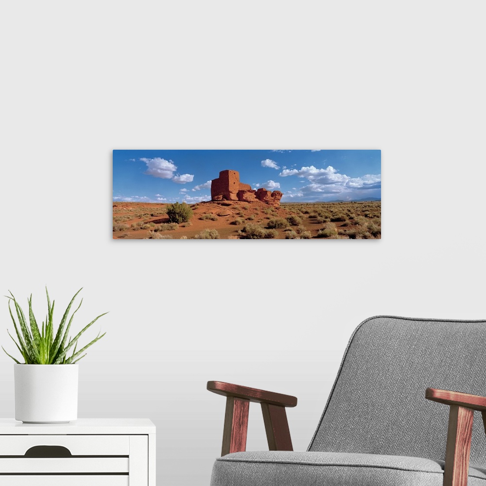 A modern room featuring Ruins of a building in a desert, Wukoki Ruins, Wupatki National Monument, Arizona