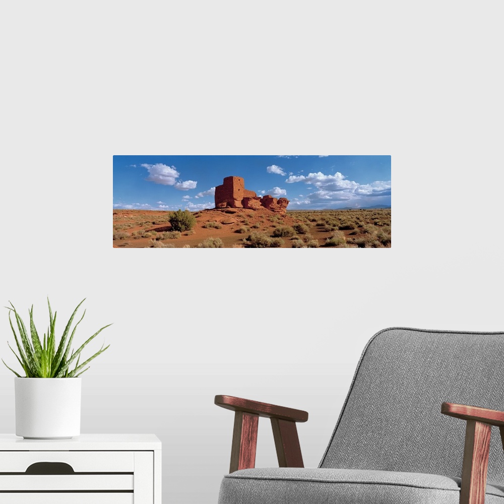A modern room featuring Ruins of a building in a desert, Wukoki Ruins, Wupatki National Monument, Arizona