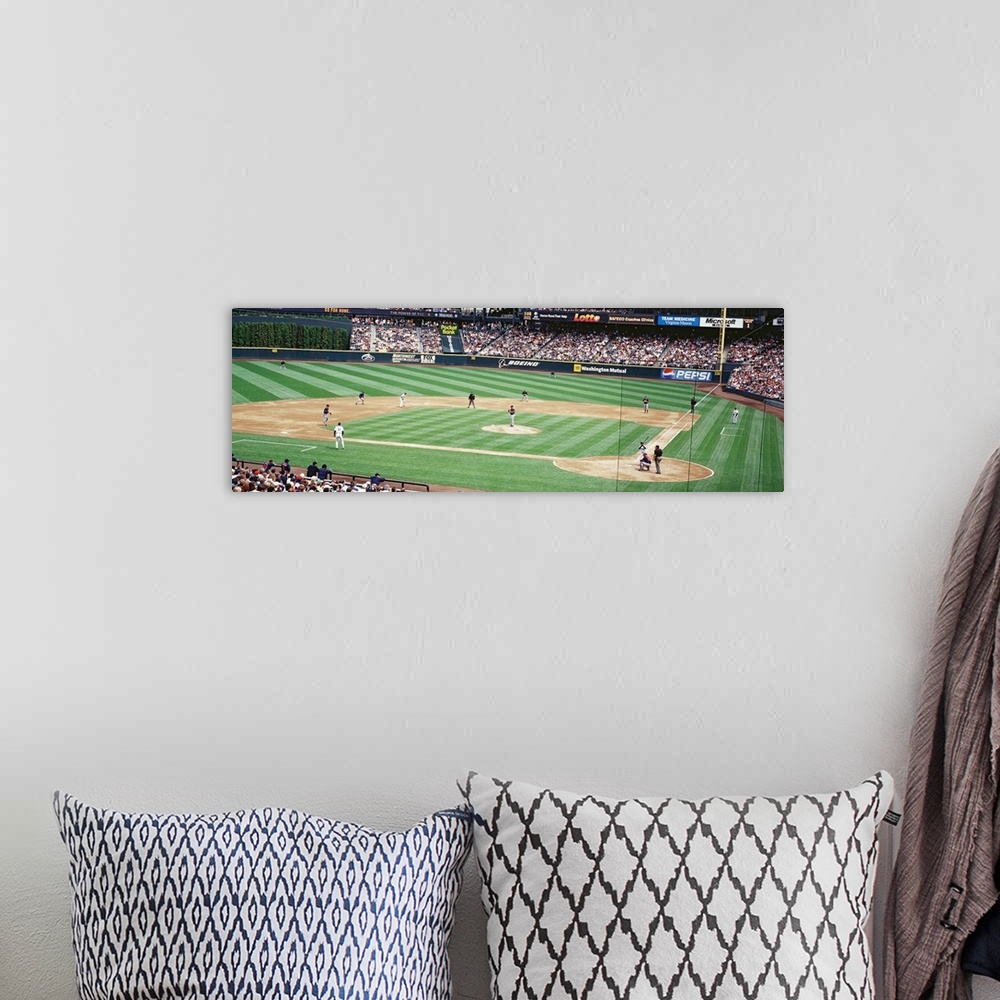 A bohemian room featuring Panoramic photograph is taken inside the Seattle Mariners baseball stadium as they play a game an...
