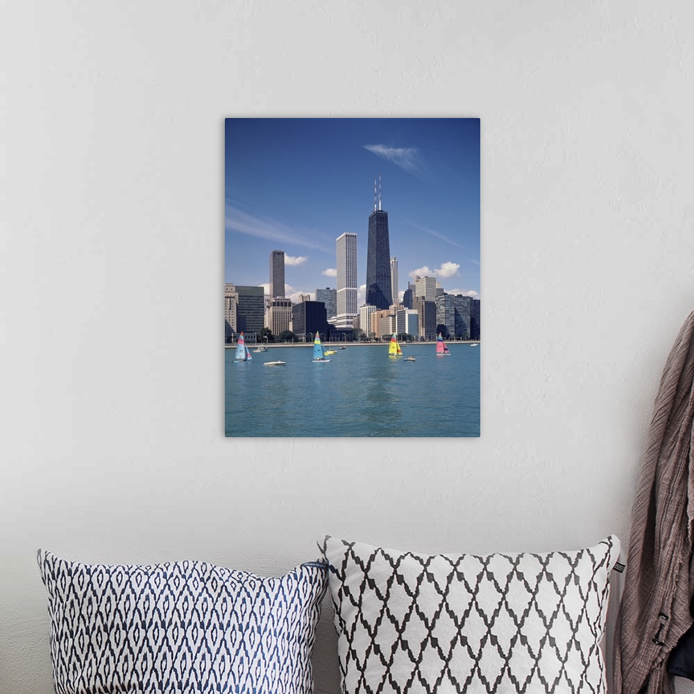 A bohemian room featuring Vertical photograph of several boats on Lake Michigan in front of Chicago skyscrapers in Illinois.
