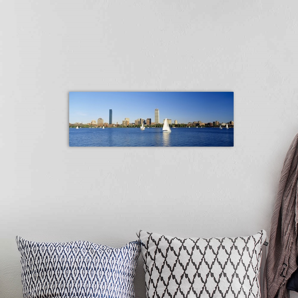 A bohemian room featuring Sailboats in a river with skyscrapers in the background, Charles river, Boston, Massachusetts