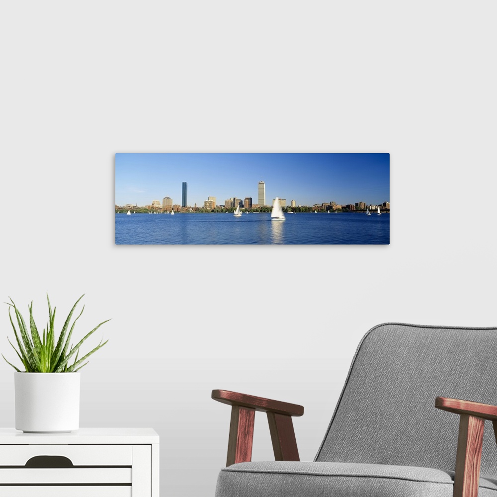 A modern room featuring Sailboats in a river with skyscrapers in the background, Charles river, Boston, Massachusetts
