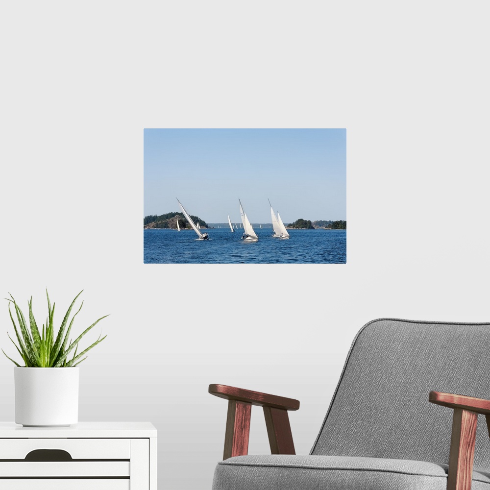 A modern room featuring Sailboats in the sea, Stockholm Archipelago, Stockholm, Sweden