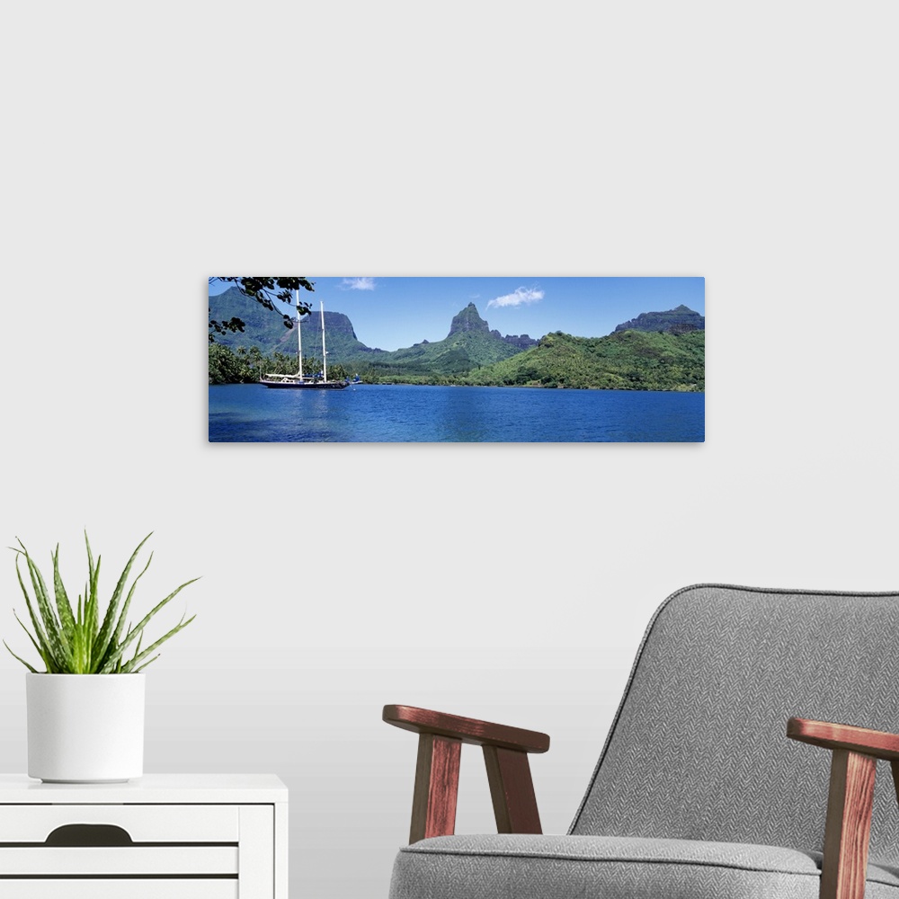 A modern room featuring Sailboats sailing in the ocean, Opunohu Bay, Moorea, French Polynesia