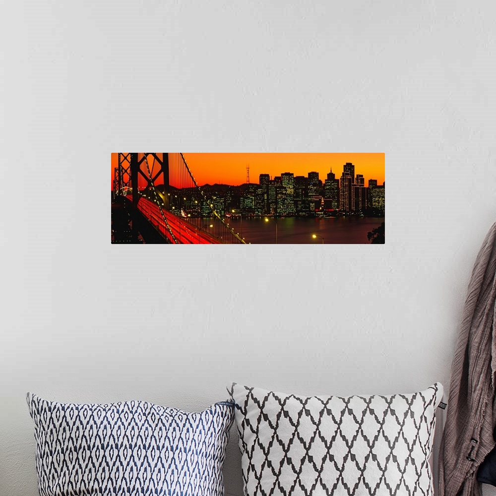 A bohemian room featuring Panoramic photograph shows a large overpass near the coast of the Western United States brightly ...